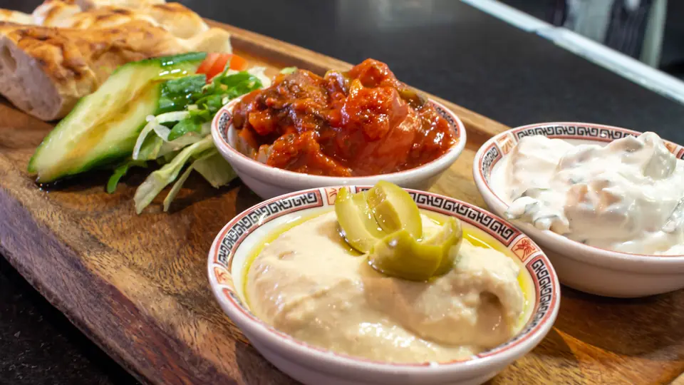 Stone-baked Turkish bread with hummus, cacik and ezme