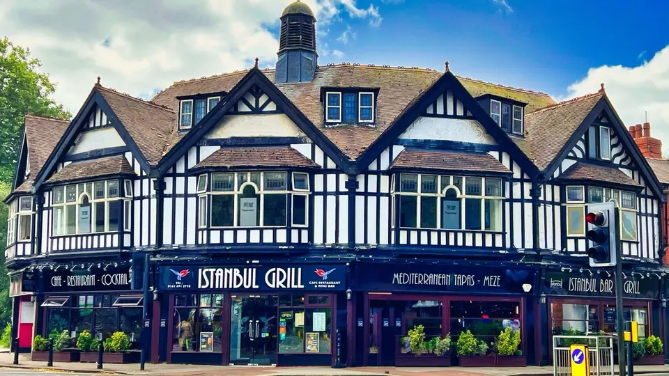 Istanbul Grill Cheadle: the black-and-white Tudor-style building on Gatley Road on a sunny day